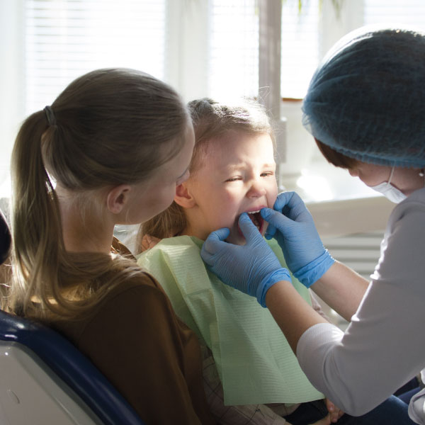 Toddler During Free Lap Visit at Dental Office in Raleigh NC