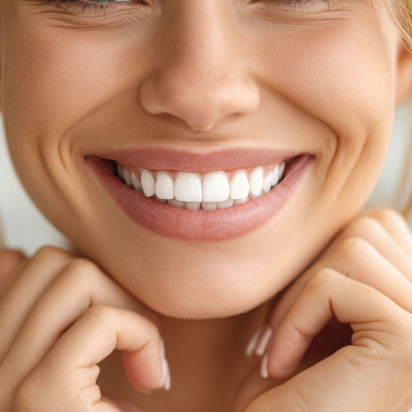 Attractive Young Man Getting Evaluated for Veneers at a Dentists Offiice