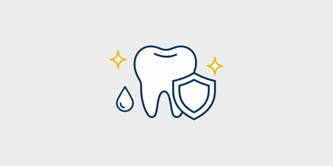Tooth protected by a shield with a fluoride droplet and sparkles illustration
