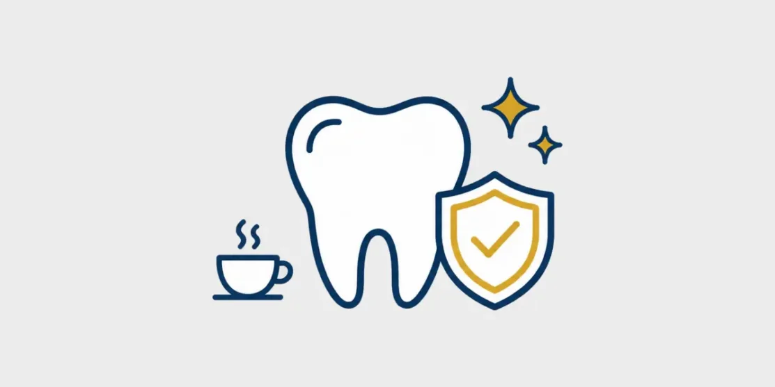 Navy and gold line icon of a bright tooth protected by a shield with a small coffee cup on a light gray background
