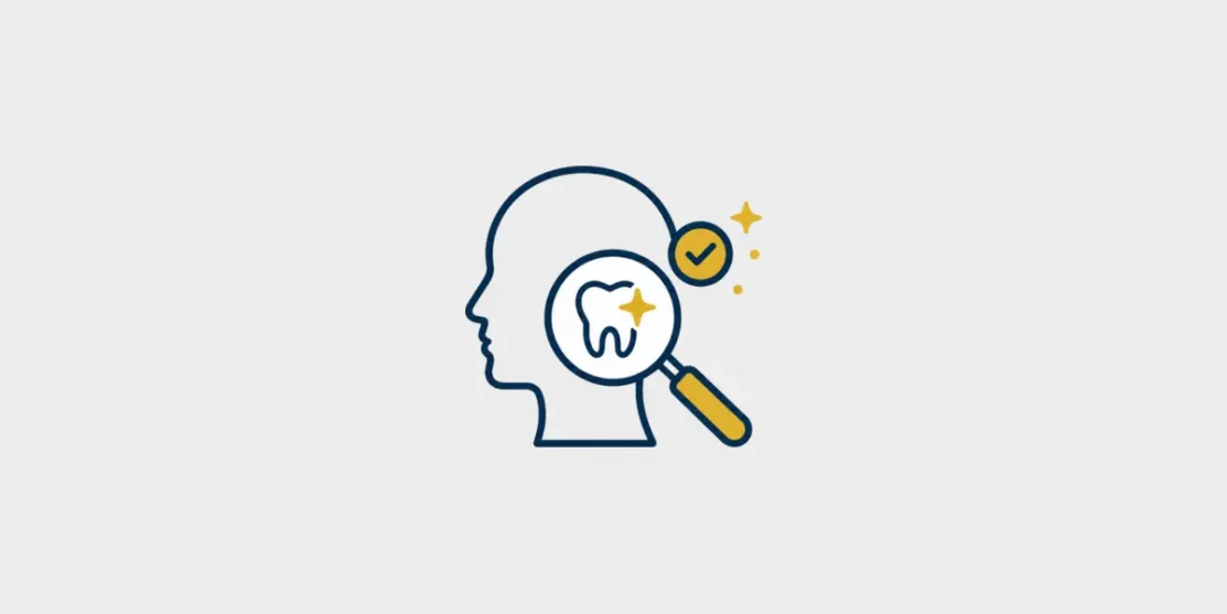 Navy and gold line icon of a head and neck profile examined with a magnifying glass on a light gray background.